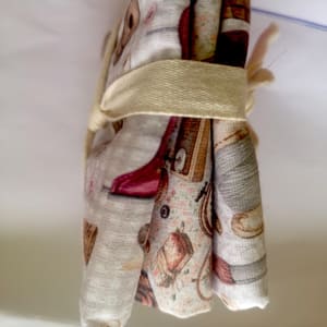 Paquete de telas con motivos de costura y punto