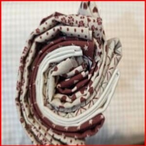 Paquete de 7 telas en granates flores, corazones, estrellitas, natural, lunares.....