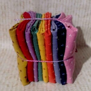 9 telas japonesas tramadas  de colores con amarillos y naranjas