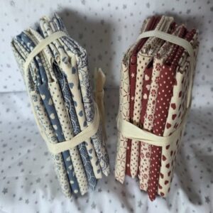 Paquete pequeño de 8 telas en granates flores, corazones, estrellitas, lunares....