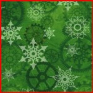 Estrellas y otros motivos geométricos sobre verde de Quilting treasures