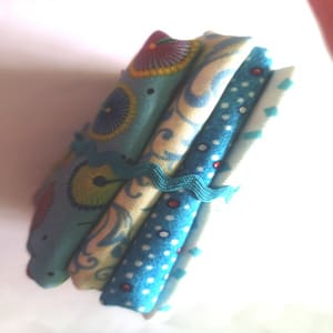 Paquete de 4  telas en  azules