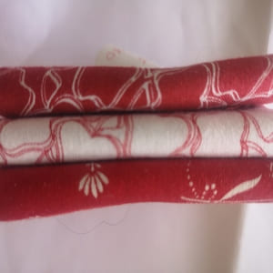 Paquete de 3  telas en rojos y granates