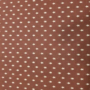 Tela country de estrellitas claras sobre granate