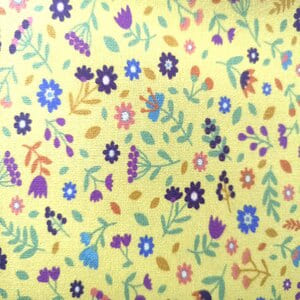 Flores  de colores sobre amarillo (1,40)