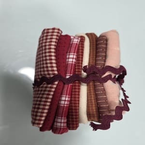 8 telas japonesas tramadas  en granates y rojas variadas