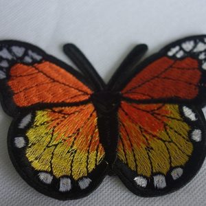 Mariposas en naranjas adhesiva para customizar
