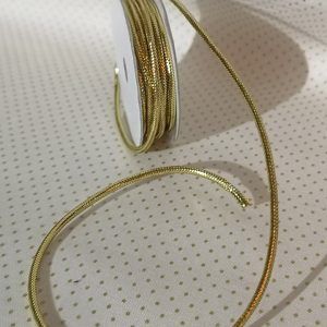 Rollo de cordón dorado metalizado de 2mm